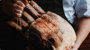 Chef holding beef 2